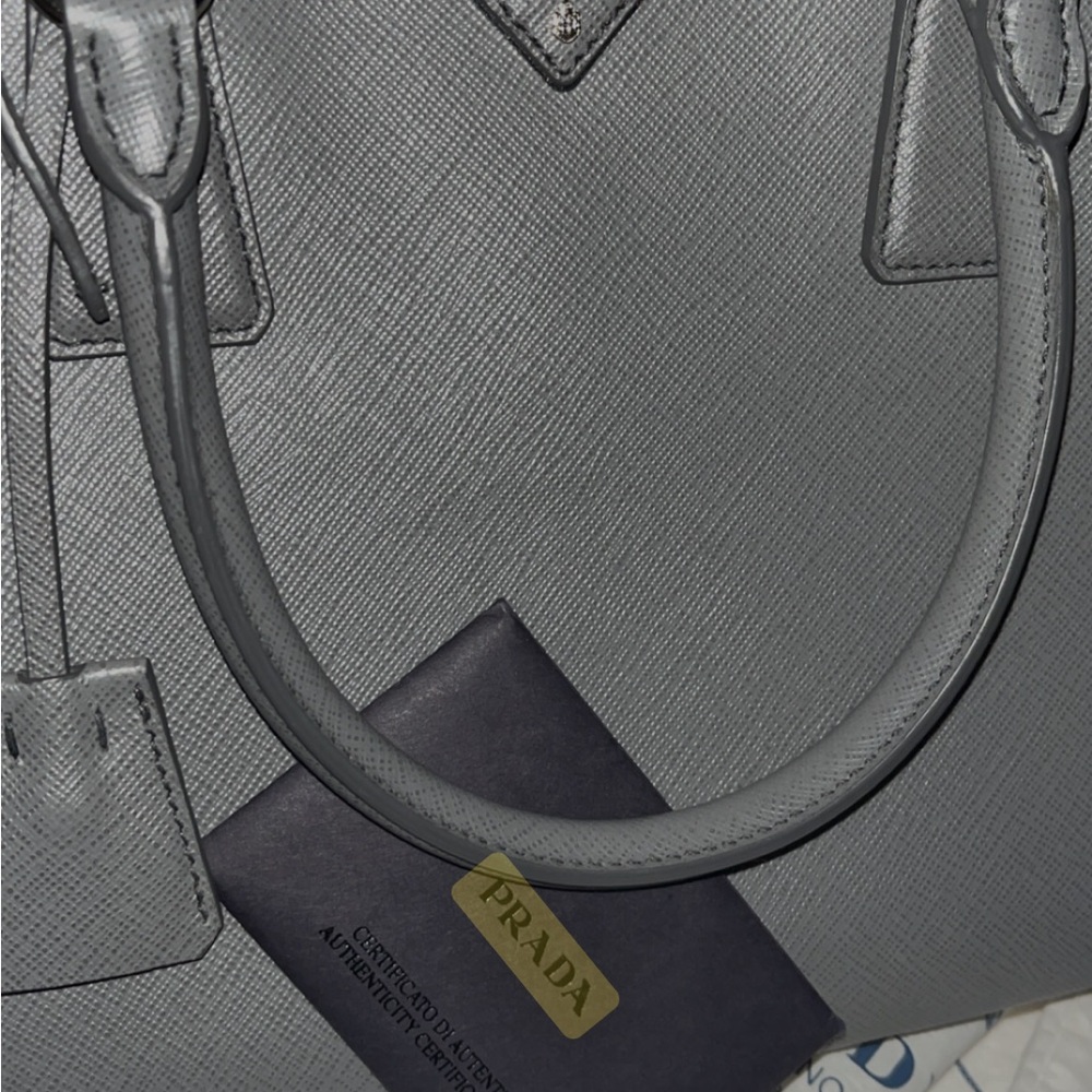Prada Gabrielle with cards and COA. Crossbody strap never used.